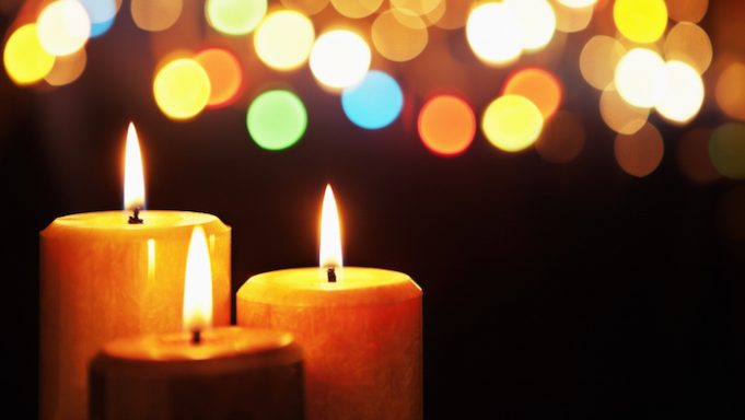 Christmas candle with blurred light